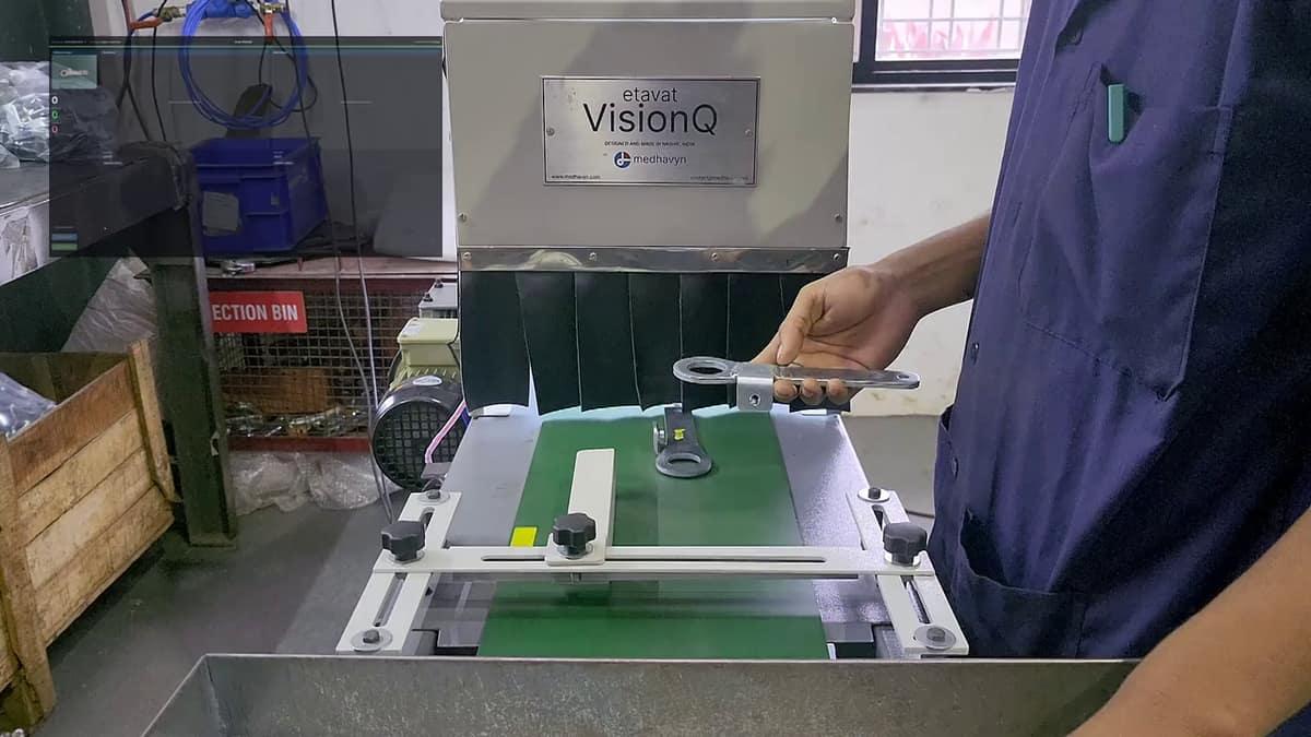VisionQ inspecting a part